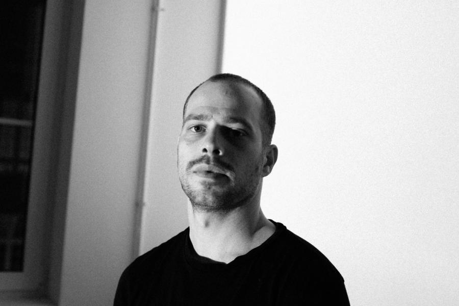 Portrait of Bad Actor black and white wearing a black t shirt
