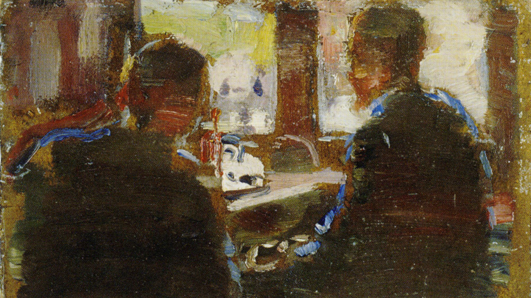 Two men sitting together at a window.