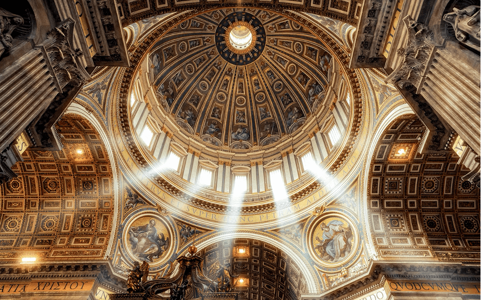 An interior view of the dome of St. Peter's Basilica in Rome.