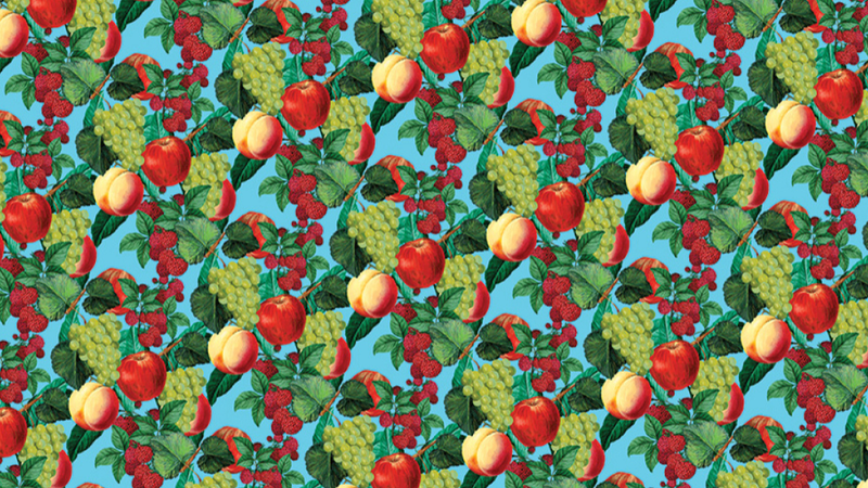 Apples, grapes, peaches, and cherries in a pattern on a blue background.