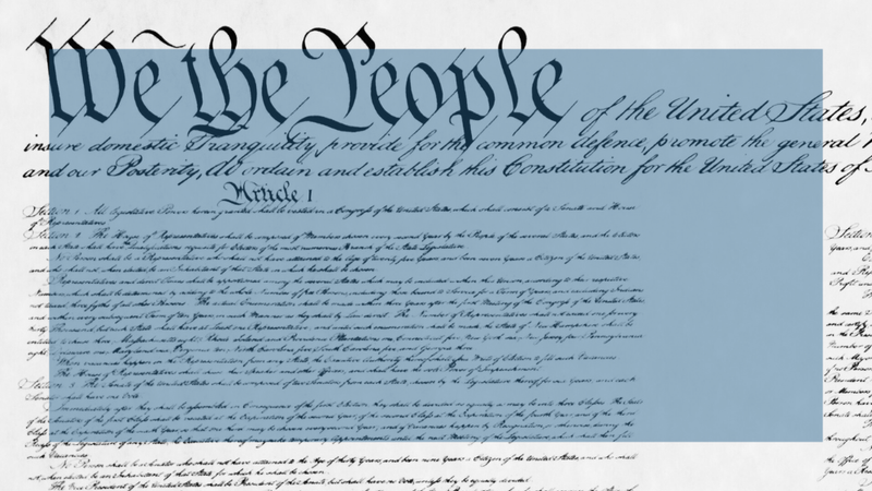 The original copy of the US Constitution written in scripted handwriting.