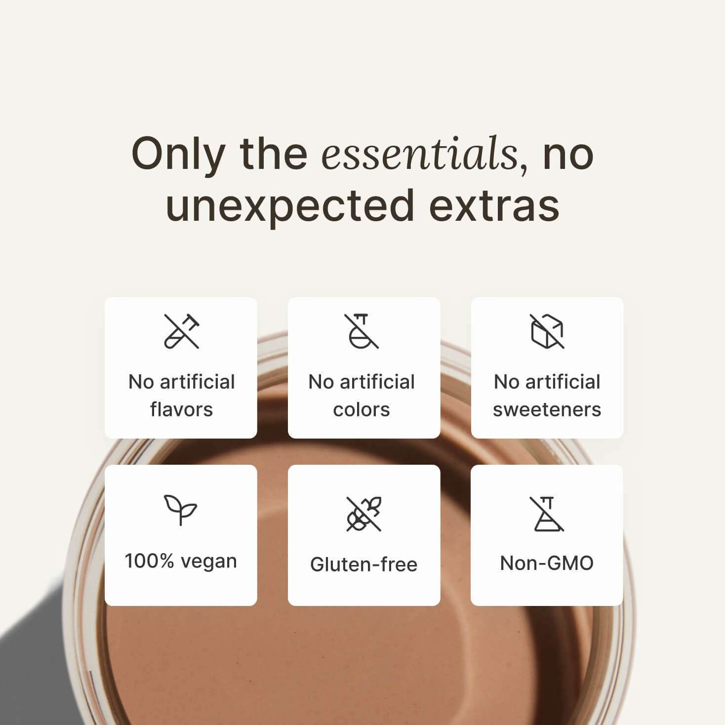 Above shot of a glass of Huel RTD on a neutral colour background