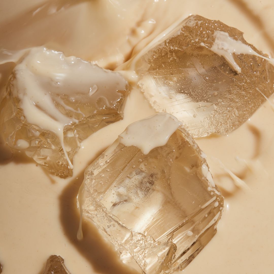 Huel Vanilla RTD with ice cubes in a glass