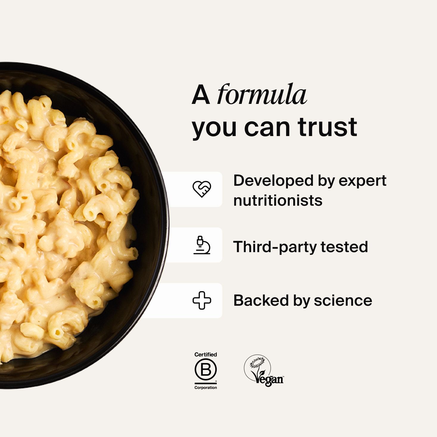 A bowl of Huel Hot & Savoury with fresh chilli and coriander on a neutral background