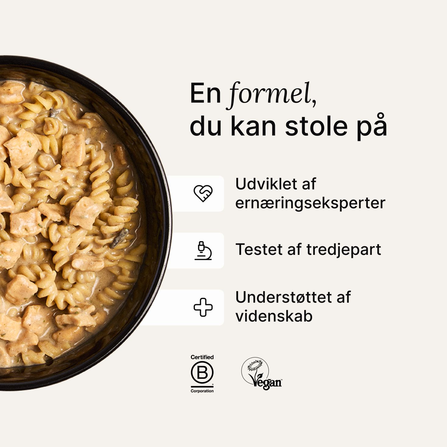 A bowl of Huel Hot & Savoury with fresh chilli and coriander on a neutral background