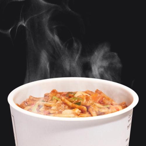 Hot And Savoury Pot close up showing steam rising from a pot of spicy noodles
