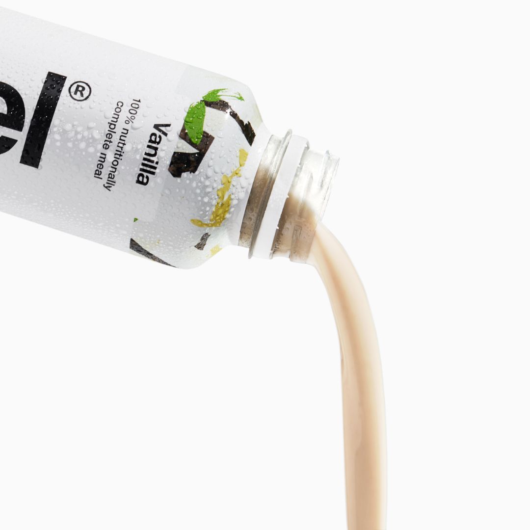Huel Vanilla pouring from a bottle of Huel Ready-to-drink