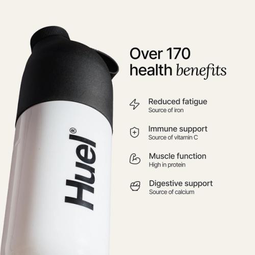 A black and white Huel shaker on a neutral background, with the benefits of Huel listed beside it