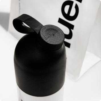 A Huel shaker and a bag of Huel Powder