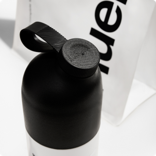 A Huel shaker and a bag of Huel Powder