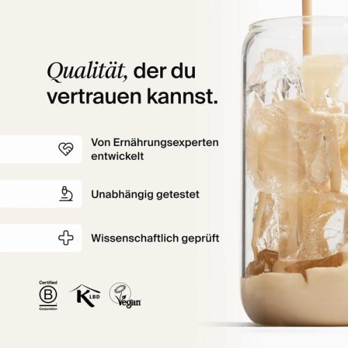 Huel meal replacement drink being poured into a glass of ice