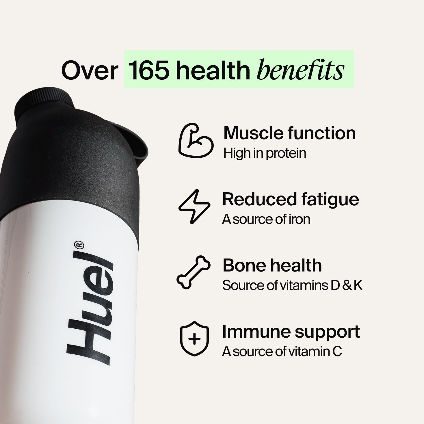 A black and white Huel shaker on a neutral colour background with health benefits in text beside it