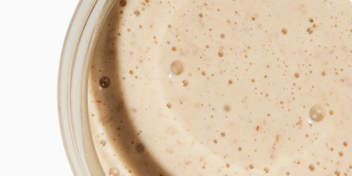 A close-up of Huel Powder in a glass