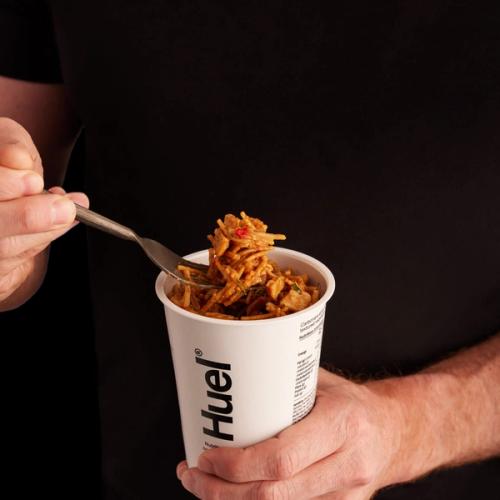 A person wearing a black t-shirt doing a Pot fork pull