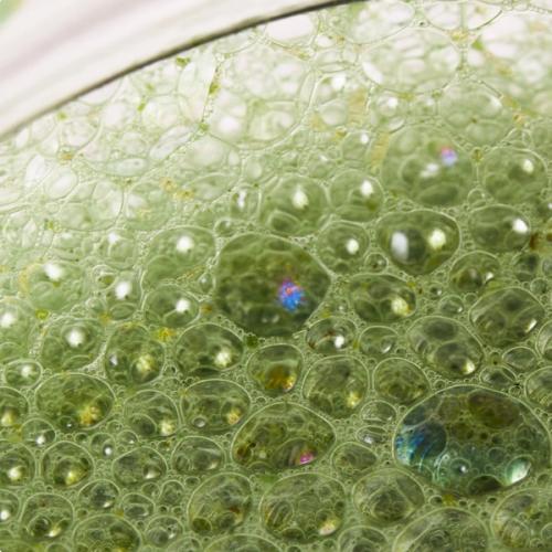 Close up of a cup of Huel Daily Greens