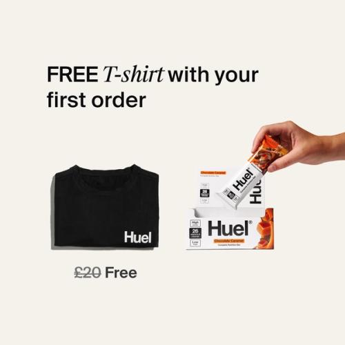 A box of Huel complete nutrition bars on a neutral background next to a black Huel t-shirt
