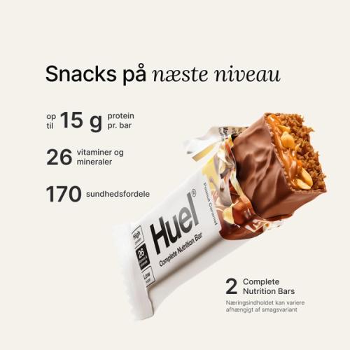 Et billede af en Huel Complete Nutrition proteinbar i en revet indpakning