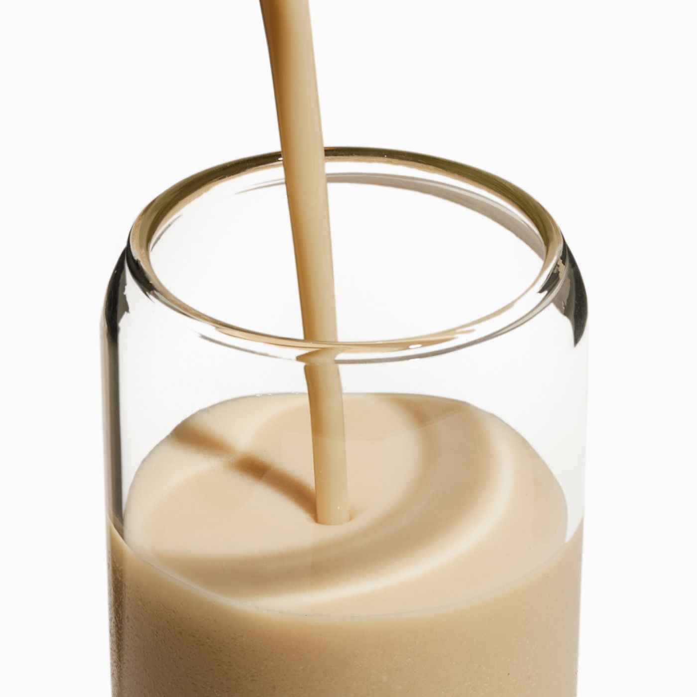 A glass of complete protein being poured 