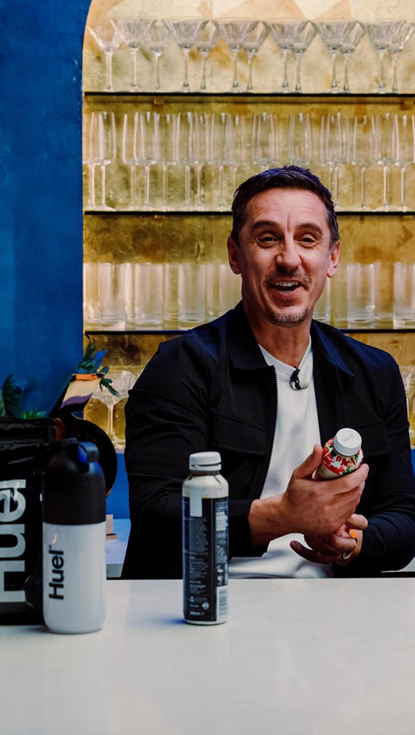 Gary neville holding Black Edition Ready-to-drink