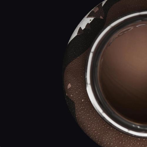 Huel Chocolate Black Edition RTD with ice cubes in a glass