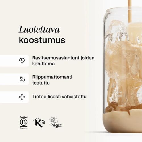 A glass of ice being filled by huel complete protein liquid