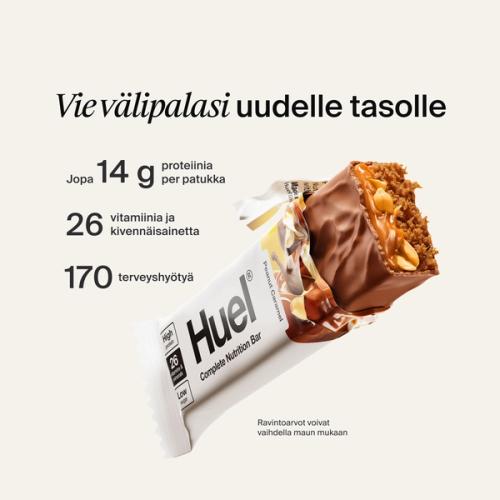 A Huel Complete Nutrition bar with a peanut and caramel filling, set against a beige-colour background