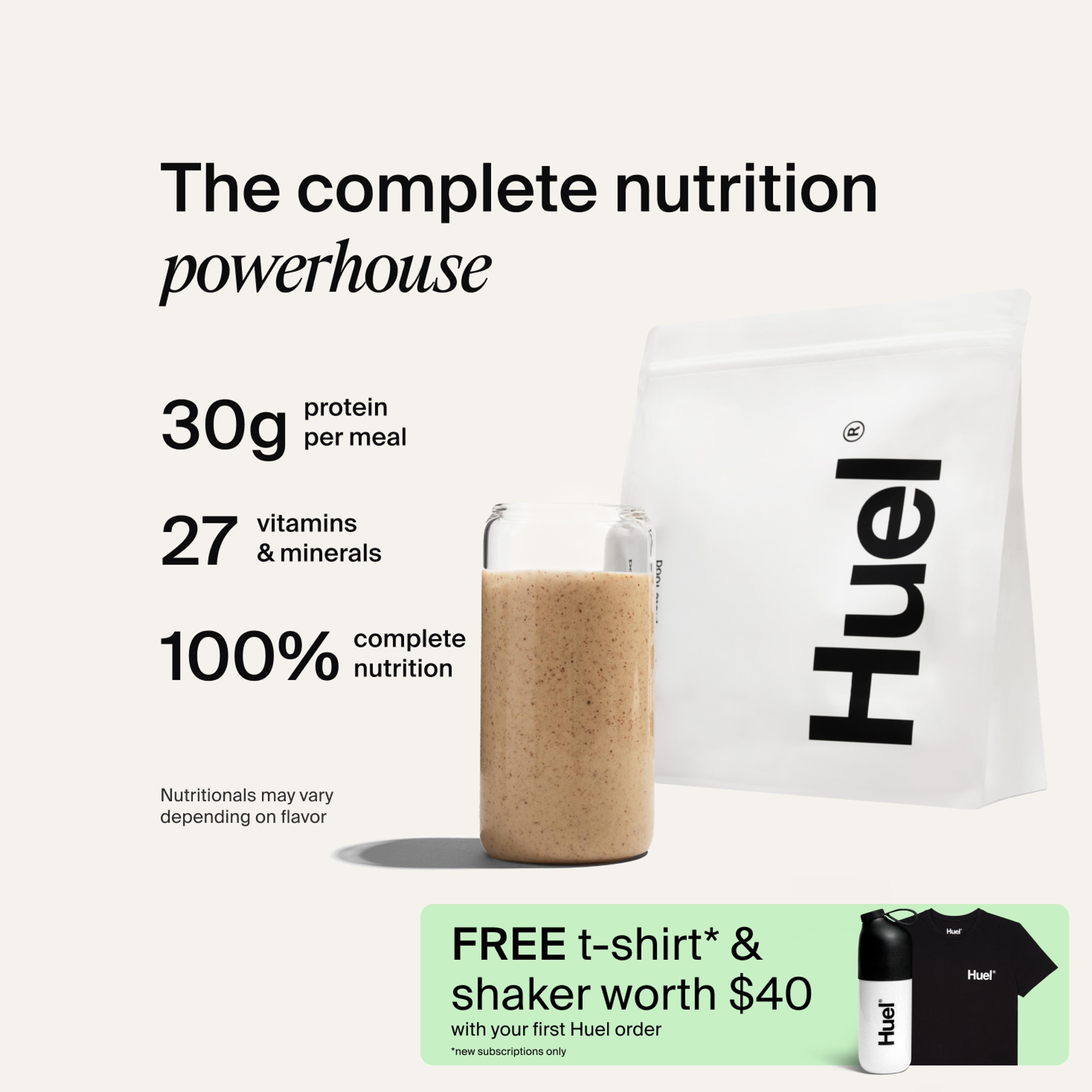 A bag of Huel powder next to a glass containing a Huel drink on a neutral background