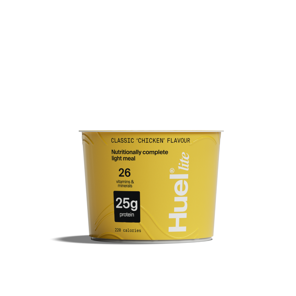 A Huel Lite Ramen pot in classic 'chicken' flavour on a plain background
