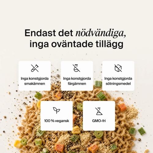 Dried vegetables, herbs and noodles mixed on a neutral colour background