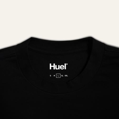 Close up of the inside of the Huel T-shirt neckline showing the sizes of the t-shirt