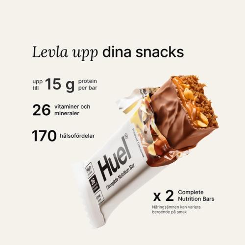 En bild av en Huel Complete Nutrition-proteinbar i ett rivet omslag