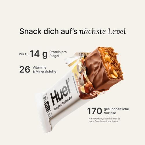 A Huel Complete Nutrition bar with a peanut and caramel filling, set against a beige-colour background