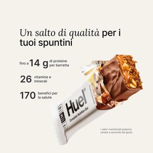 A Huel Complete Nutrition bar with a peanut and caramel filling, set against a beige-colour background