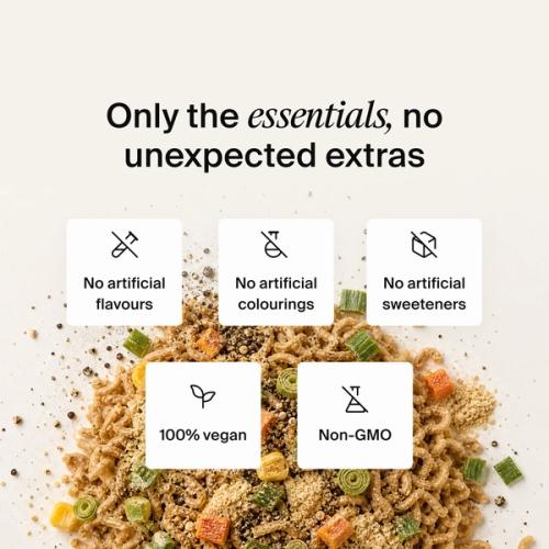 Dried vegetables, herbs and noodles mixed on a neutral colour background
