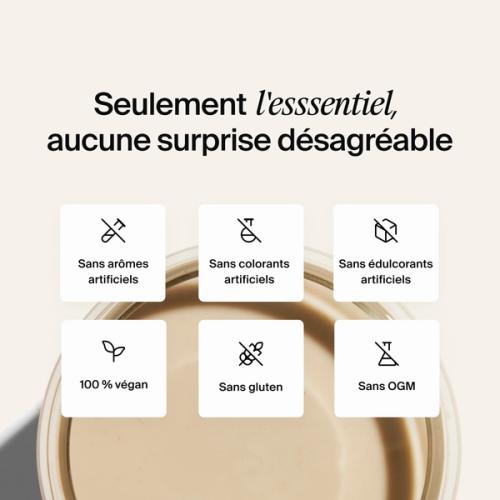Above shot of a glass of Huel RTD on a neutral colour background