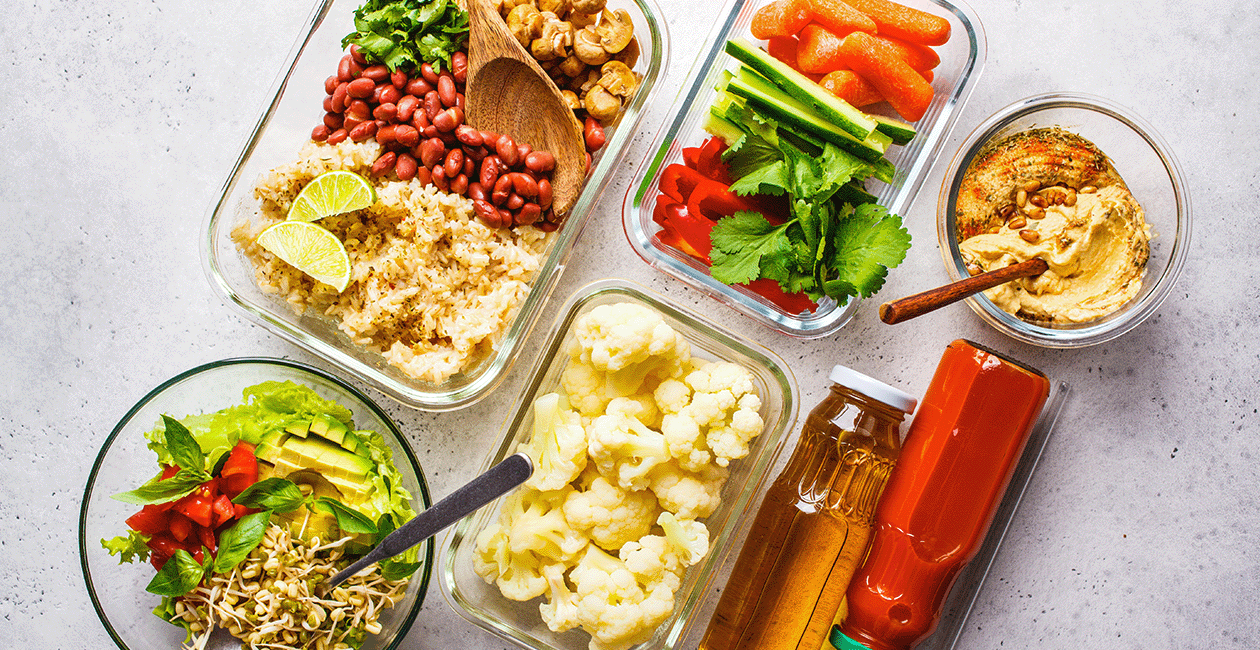 different plant based meal preps in glass dishes