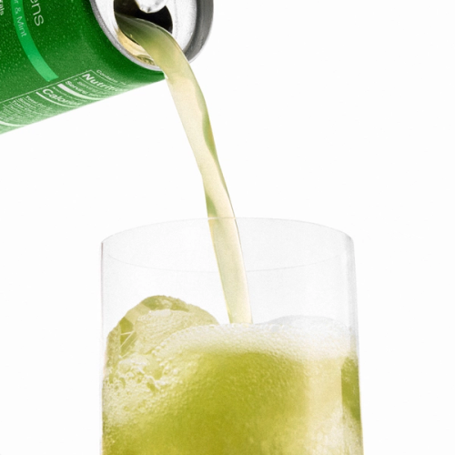 A can of Daily Greens Ready-to-drink pouring into a glass with ice