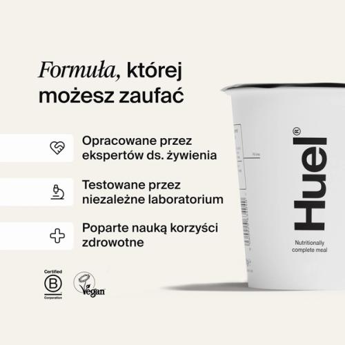 Biały garnek Huel na kremowym tle z objaśnieniami dotyczącymi naukowych kwalifikacji Huel
