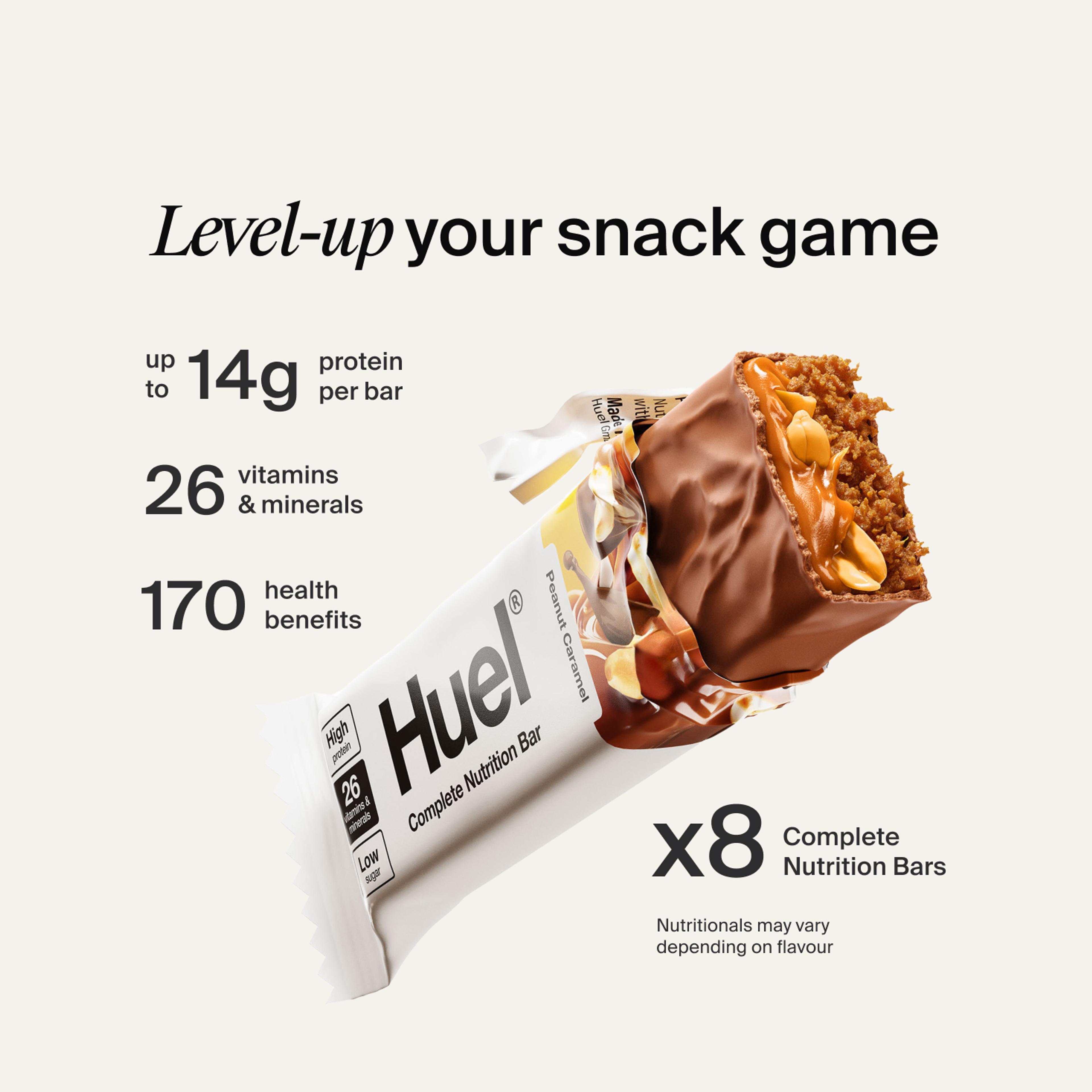 Huel Complete Protein bar with its wrapper ripped open on a neutral colour background