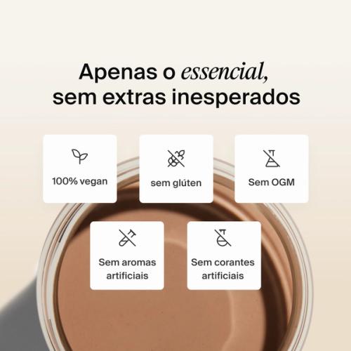 A top-down picture of Huel chocolate Ready-to-drink in a glass with ice