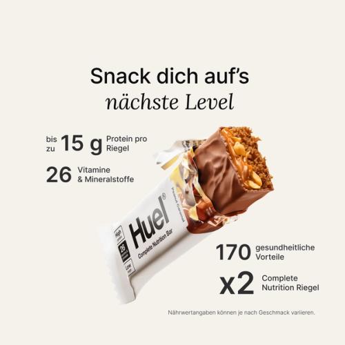 An image of a Huel Complete Nutrition protein bar in a ripped wrapper