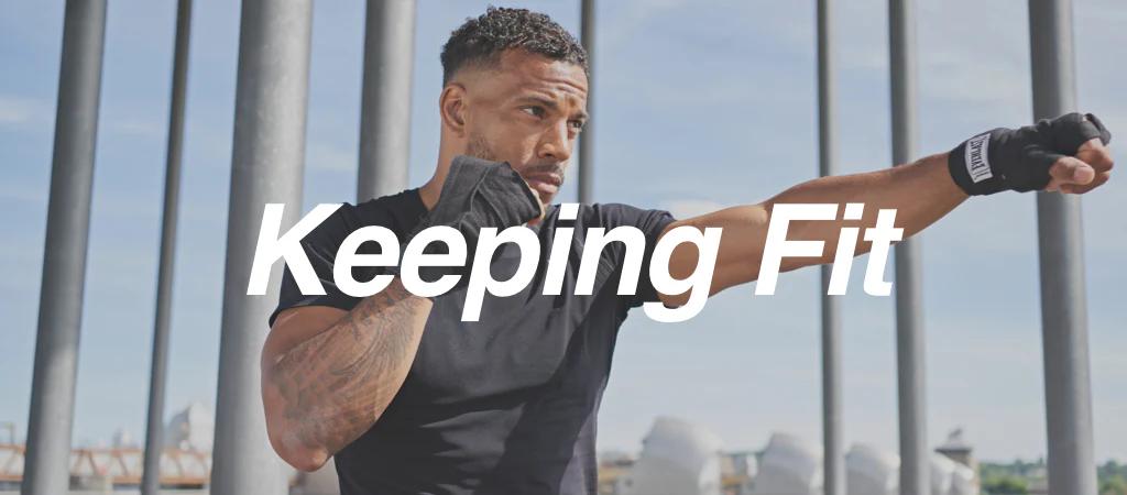 Man working out with 'keeping fit' copy in image