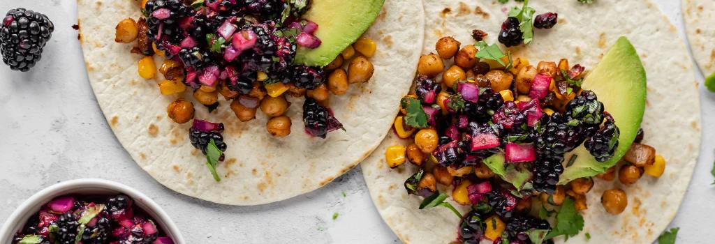 Two blackberry tacos with avocado and chickpeas - small