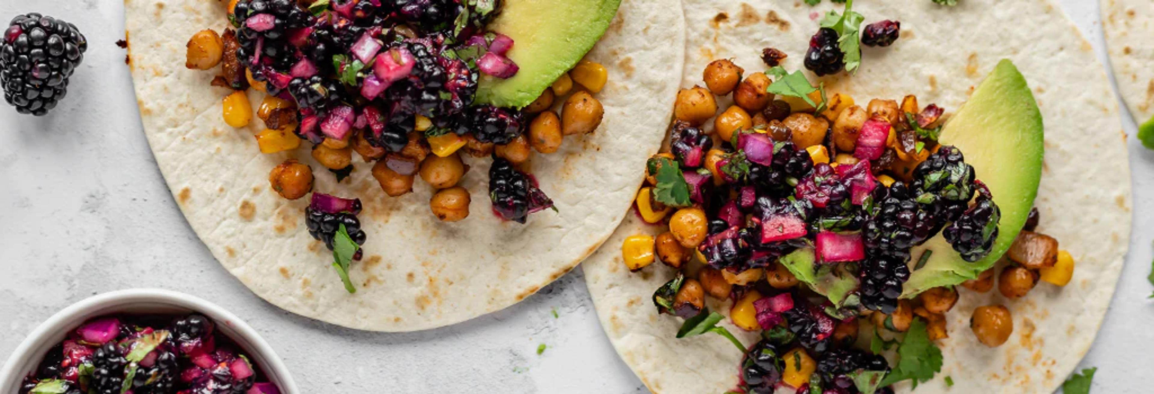 Two blackberry tacos with avocado and chickpeas - small