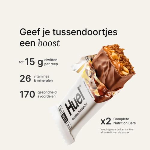 Een afbeelding van een Huel Complete Nutrition eiwitreep in een gescheurde verpakking