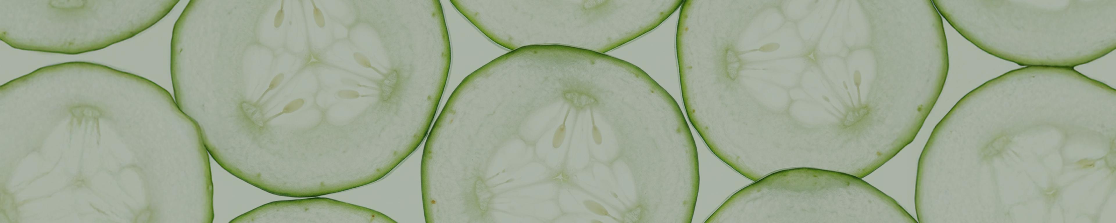 A close up of cucumber slices