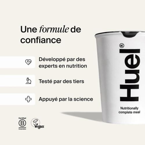 Un pot de Huel blanc sur un fond blanc cassé avec des légendes expliquant les références scientifiques de Huel.
