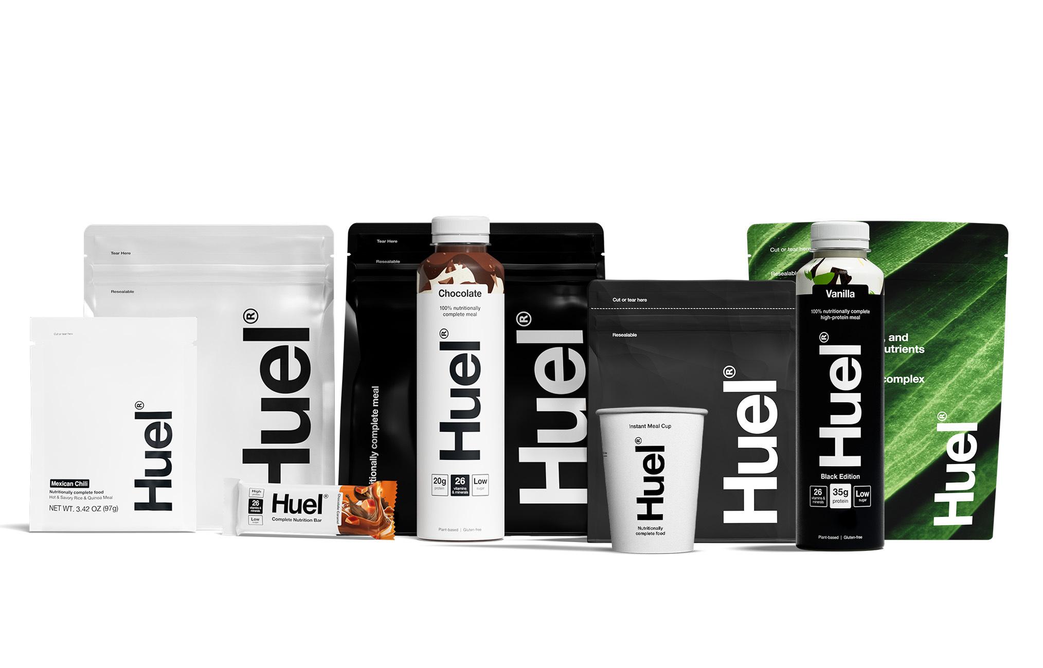 Selection of Huel products, from instant vegan meals to powdered meal replacement shakes and high protein ready-to-drink bottles.