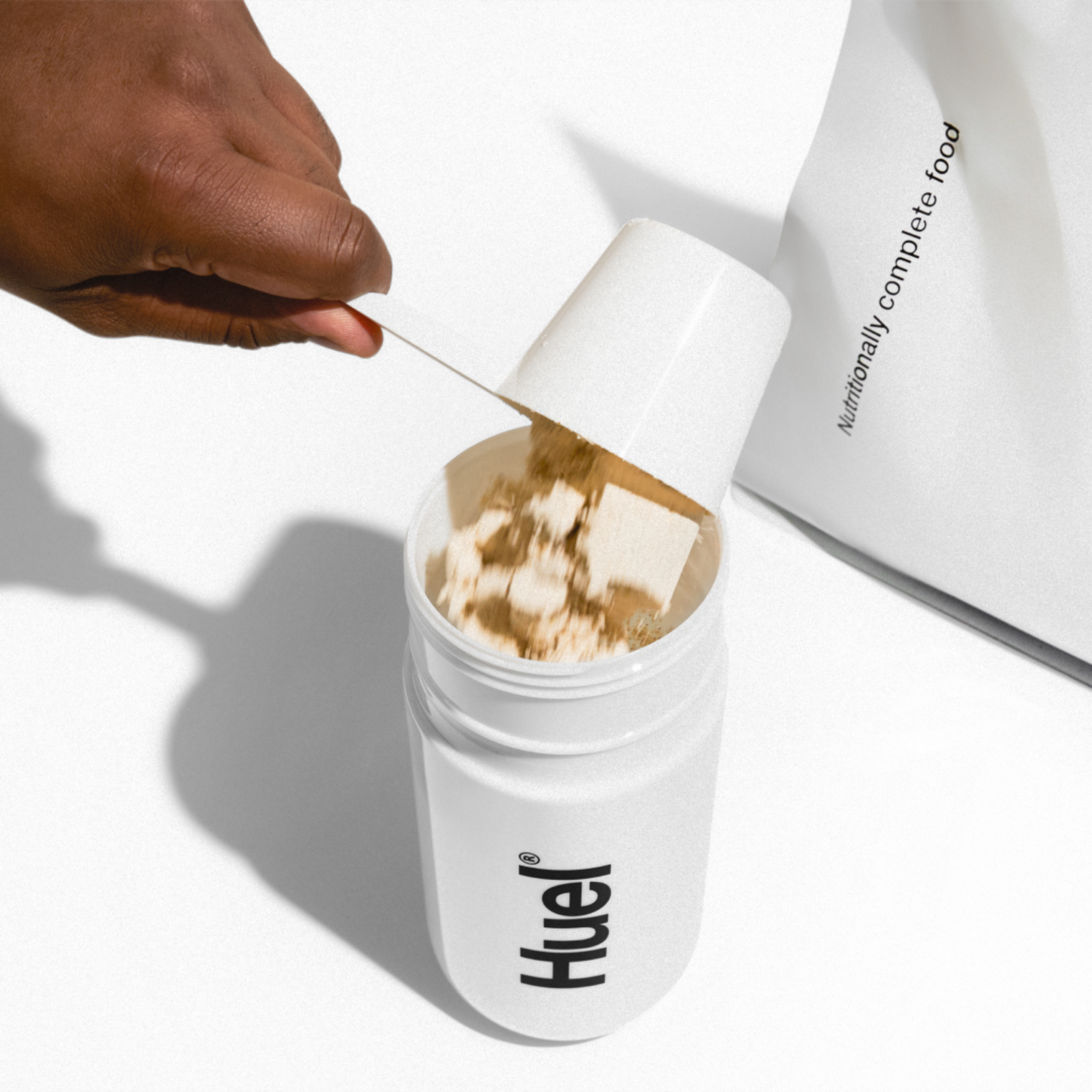 Add two scoops of Huel Powder