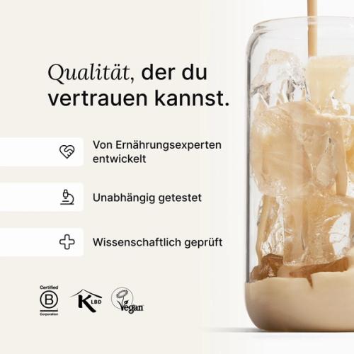 Huel meal replacement drink being poured into a glass of ice